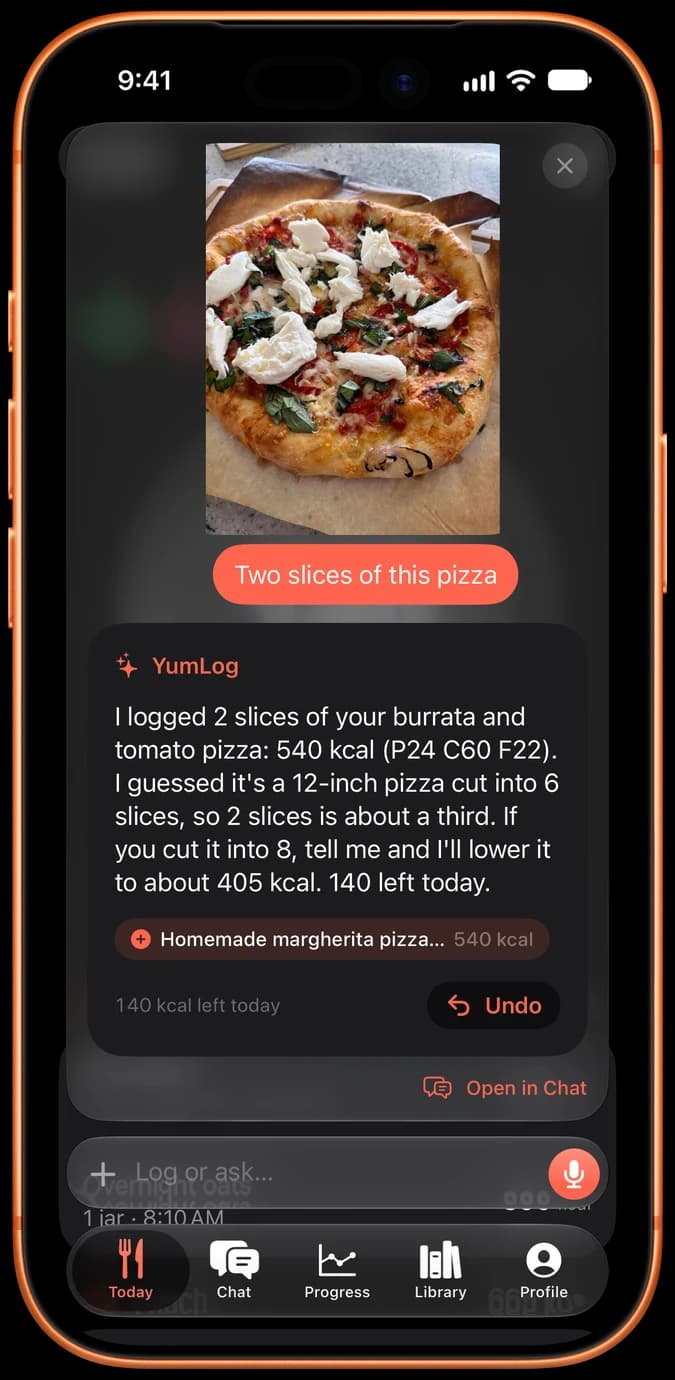 iPhone showing YumLog logging two slices of pizza from a photo.